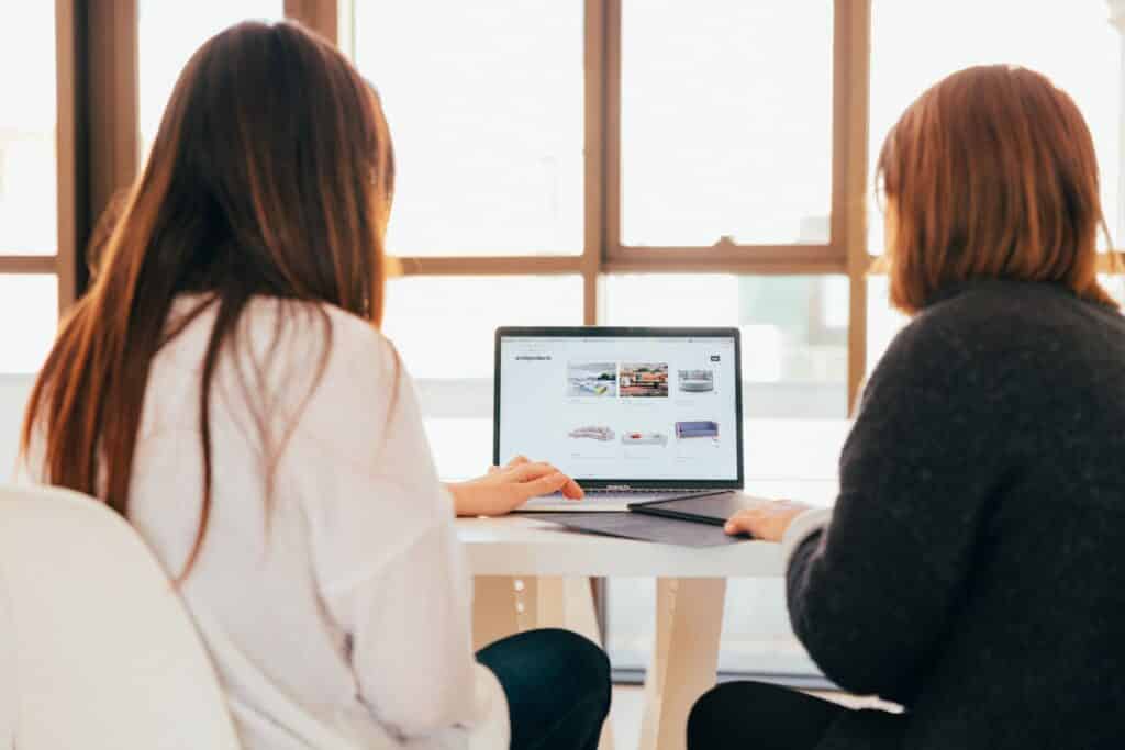 2 women problem solving at work