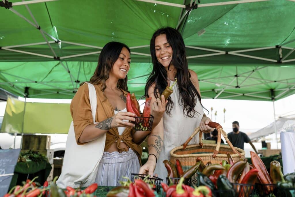 Women grocery shopping at a local market