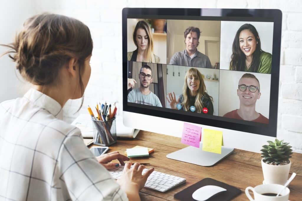 Woman in a video conference call in her home office